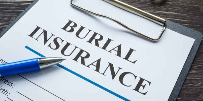 Person reviewing burial insurance options